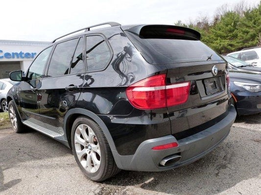 download BMW X5 48I workshop manual