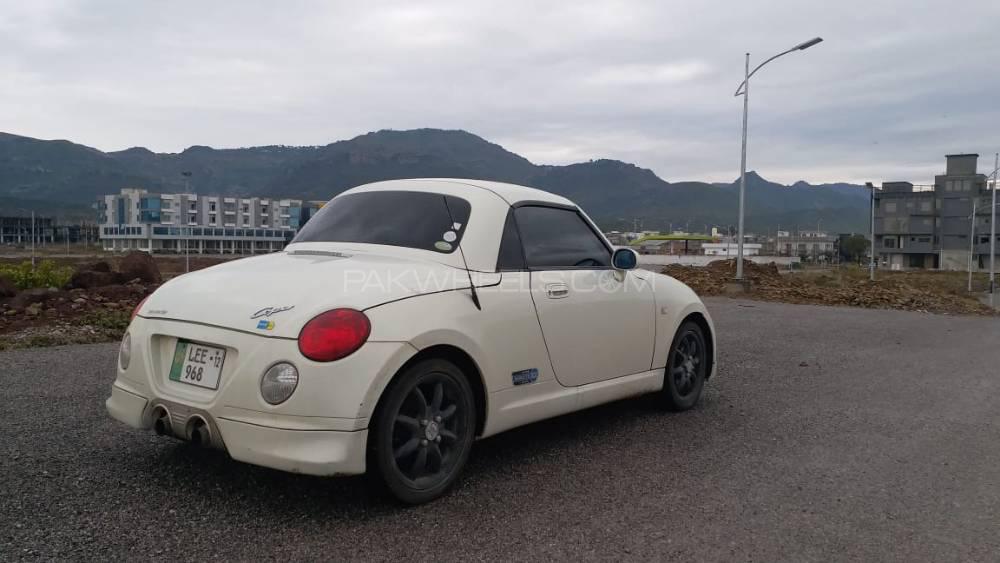 download Daihatsu Copen workshop manual